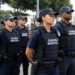 Agentes da Guarda Municipal em formação durante operação de segurança pública em Minas Gerais.