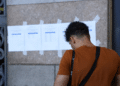 Candidato do CNU analisando lista de opções de lotação para escolha de local de atuação.