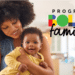 Mulher negra segurando bebê sorridente no colo ao lado do logo colorido do Programa Bolsa Família.