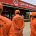Bombeiros de Roraima em formação durante solenidade oficial em frente ao quartel do Corpo de Bombeiros Militar.
