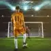 Jogador se prepara para cobrar pênalti diante do goleiro em estádio de futebol iluminado.